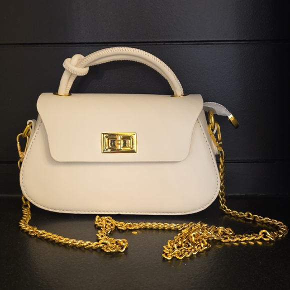 Elegant Cream Handbag with Gold Accents - Picture 1 of 4